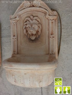 Fontana in cemento da muro con leone